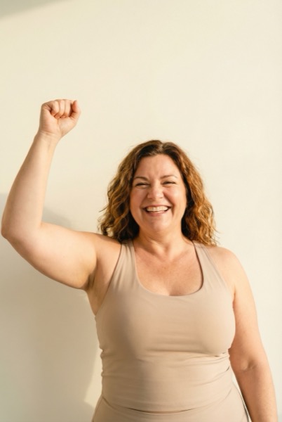 Woman celebrating in victory pose