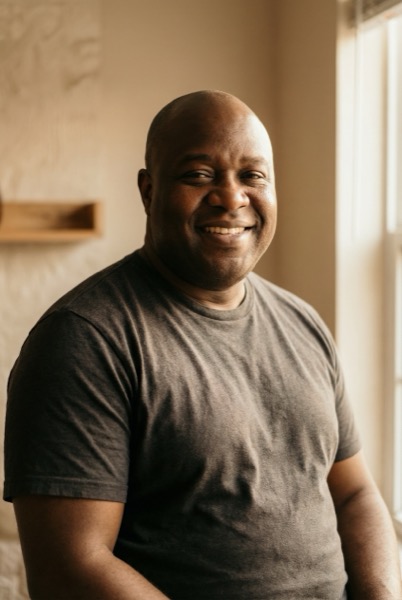 Man celebrating weight loss journey